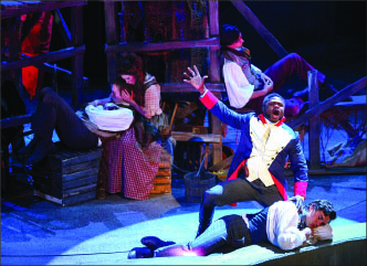 ART —Les Miserables takes viewers on a journey to19th-century France and gives a fictional taste of the real-life uprising in Paris in 1832. Photo credit: Ruth Bibby