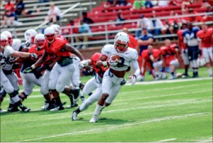 tag —Liberty’s football team gave fans a sample of next season in its first public scrimmage. Photo credit: Courtney Russo