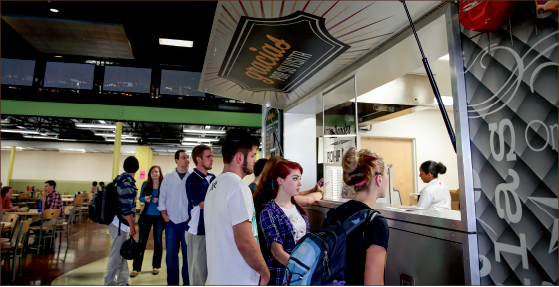 FOOD — Students eagerly wait in line at the new Wholly Habaneros restaraunt in order to get their hands on burritos and quesadillas. Photo credit: Courtney Russo