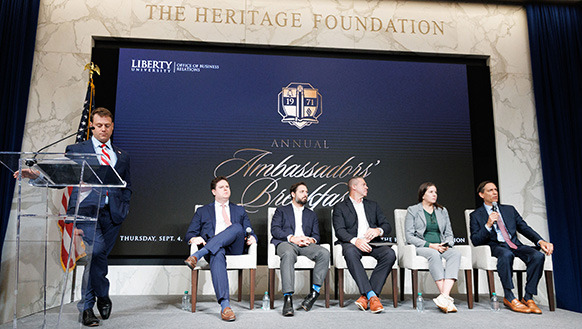 Moderator Ned Rauch-Mannino from The Heritage Foundation leads a panel discussion on global commerce.