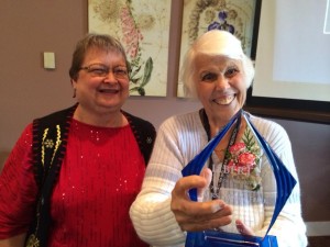 RESPECT — Mary Fink (right) is honored for her contributions during a luncheon following her retirement.