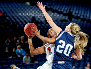 DRIVE — Freshman Candice Leatherwood attacks the hoop against Longwood. Photo credit: Courtney Russo