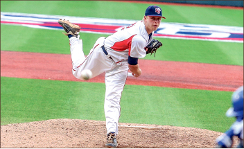 Bring the heat — Senior first baseman/pitcher Alex Close hurls a fastball. Photo credit: Leah Seavers