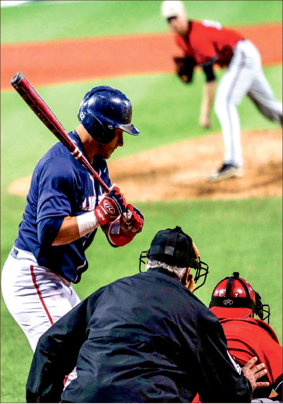 Staying Patient — Senior catcher Becker Sankey takes a pitch against Gardner-Webb. Photo credit: Leah Seavers