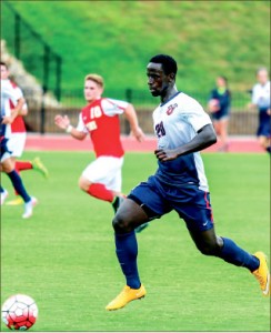 Control — Junior Dre Diouf plays in only his third game as a Flame. Photo credit: Michela Diddle
