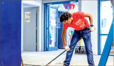Fellowship — Liberty students worked together to fix up a local community organization. Photo credit: Joel Coleman