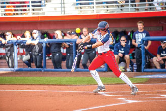 Contact — Sophomore Tori Zavodny connects during Saturday’s doubleheader. Photo credit: Leah Seavers
