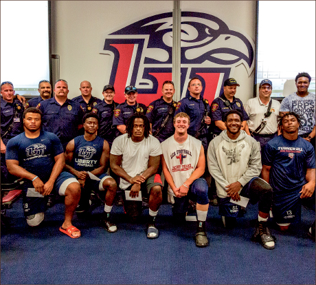 HEROES — A total of nine football players were recognized for their service in saving Marquel Franklin from a house fire. Photo credit: Joel Coleman