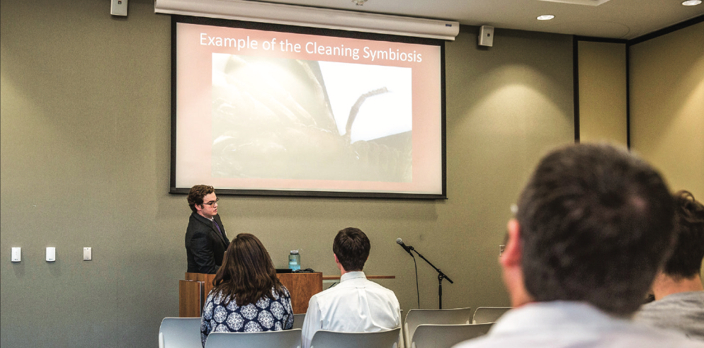 LEARN — Student Benjamin Groski presented his research ndings in March 2016 to a crowd in the Jerry Falwell Library. Research symposiums are held regularly at the library. Photo credit: Jessie Rogers