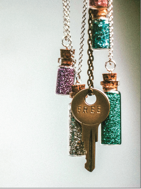 GLITTER — The jars are sold as necklaces. Photo credit: Jenna SoloMon