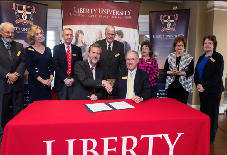 GRATITUDE — Members of the Charles B. Keesee Educational Fund board signed a partnership with Liberty University that will provide grants to graduate residential students in the Rawlings School of Divinity. Photo Credit: Kaitlyn BecKer 