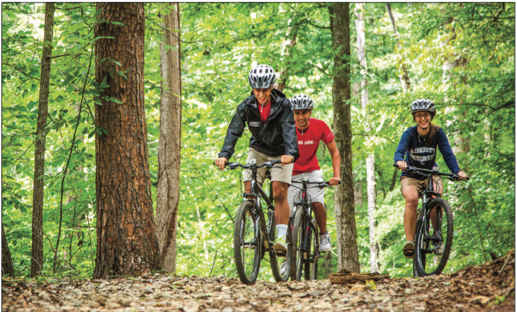 EXERCISE — A group of people took a trail ride through the many paths surrounding the Camp Hydaway lake. Photo Credit: Kevin Manguiob
