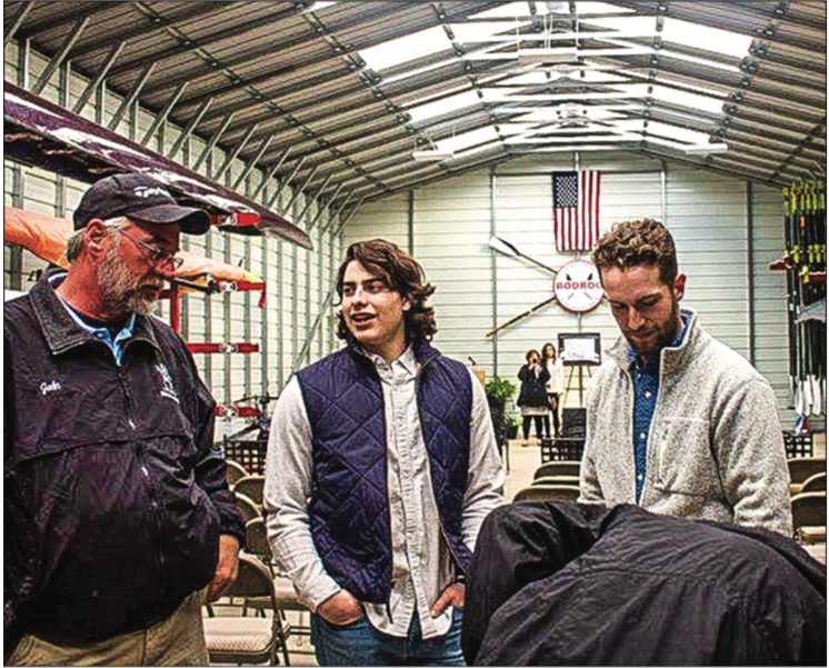 IN HONOR — The crew team gathered for a dedication ceremony at their boathouse April 7. Photo Provided