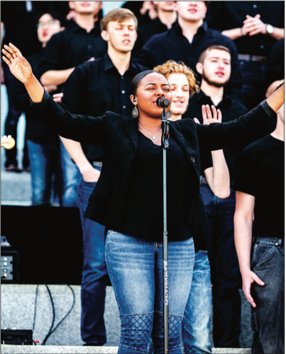 AMAZING GRACE — The Liberty Worship Collective and a choir from the school of music led the guests at Convocation in worship. Photo Credit: Michela Diddle