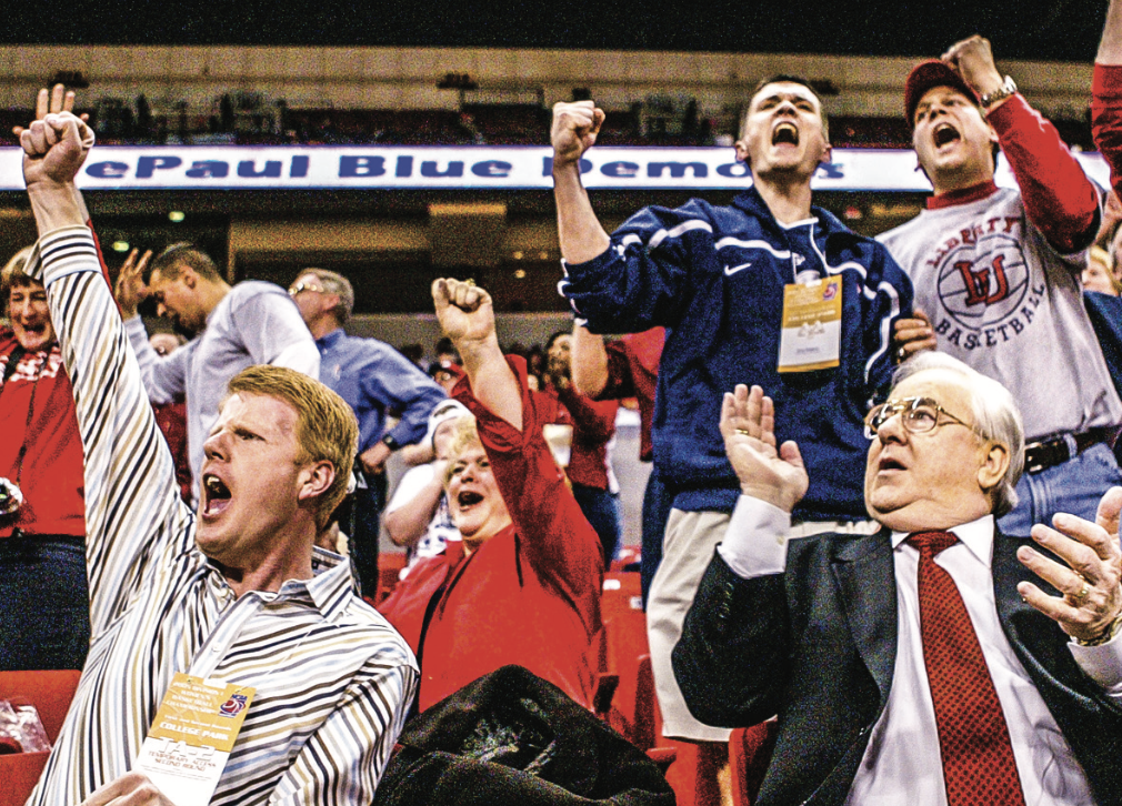 onathan Falwell and Jerry Falwell Sr. cheer on the Lady Flames basketball team in the 2nd round of the 2005 NCAA tournament. Photo Credit: Les Schofer