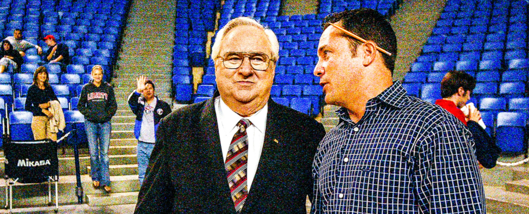 Shane Pinder talks with Jerry Falwell Sr. at a volleyball match versus Charleston Southern.