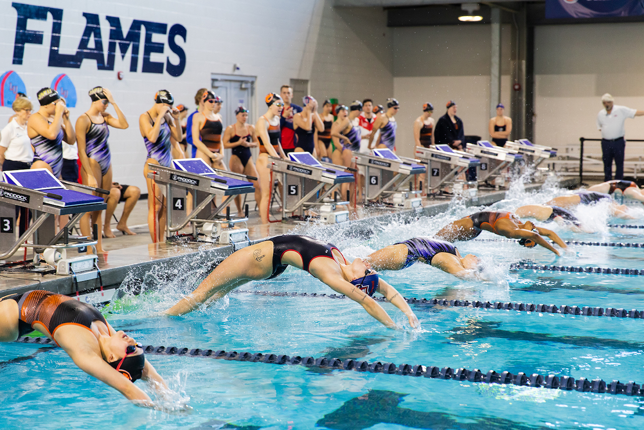 Liberty Flames swimming and diving team takes home backtoback
