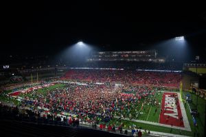 Flames fans stormed the field after the team’s CUSA Title triumph.