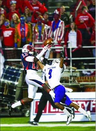 JUMP BALL — Peterson snagged two touchdowns in the first quarter against Kentucky Wesleyan, tying his career high. Photo credit: Ruth Bibby