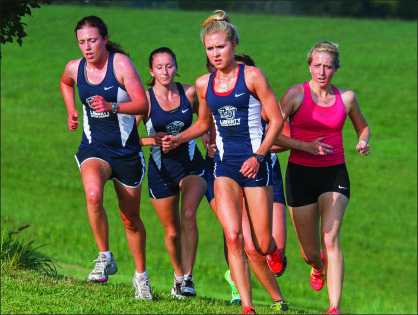 BREAKING A SWEAT — The women’s team looks to mature and improve as the season progresses. Photo credit: Joel Coleman