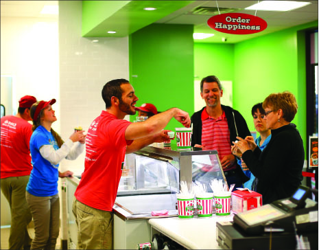 Welcome — Stephen Putney, Liberty’s assistant director for Christian/Community Service, and family enjoy Rita’s, the newly opened dessert shop. Photo credit: Ruth Bibby