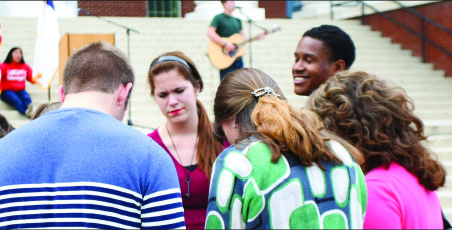 CONNECTION — Students gathered on the front steps of DeMoss Hall to pray for individual states, state officials and the nation as a whole. Photo credit: Courtney Russo