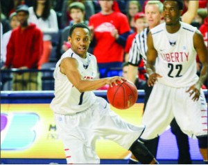CROSSOVER — Davon Marshall (1) set a new school record with 107 three-pointers last season. Photo credit: Ruth Bibby