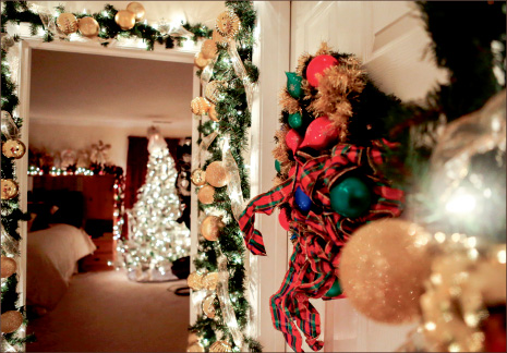 decorate — Tom Donovan and Sundi Donovan start decorating their house for Christmas in September. Photo credit; Courtney Russo