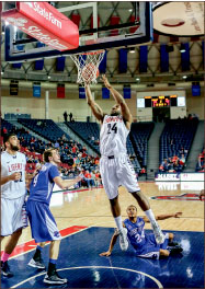 Dunk — Antwan Burrus scored his 1,000th career point against Presbyterian. Photo credit: Courtney Russo