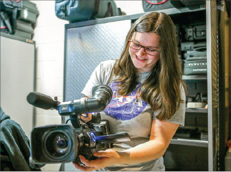 cameras — Students demonstrate how to use some of the updated equipment from the School of Communication & Creative Arts. Photo credit: Leah Stauffer