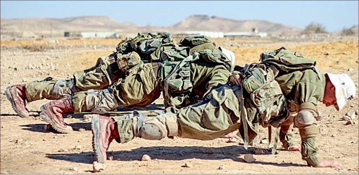 Embattled — Members of the Israeli Defense Forces train for battle as mounting attacks from surrounding nations continue to threaten the Jewish state from every direction. Google Images
