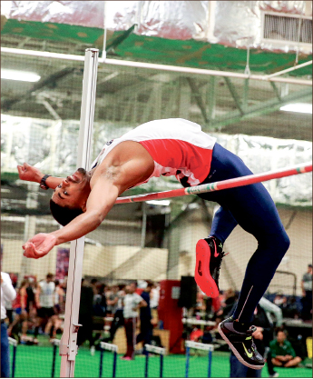 High Flying — Jumping events were some of the many that the Flames dominated. Photo credit: Courtney Russo