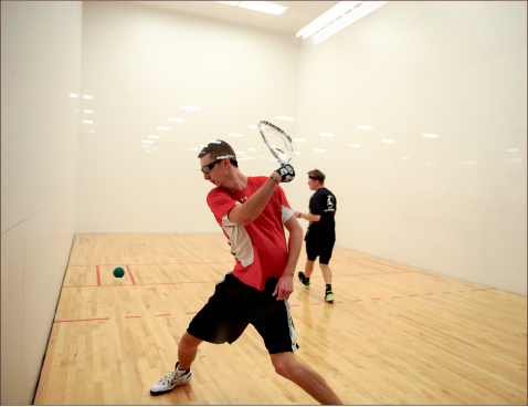 FOCUS — A student duels with Thomas Road Baptist Church worship pastor Charles Billingsley in racquetball. Photo credit; Courtney Russo