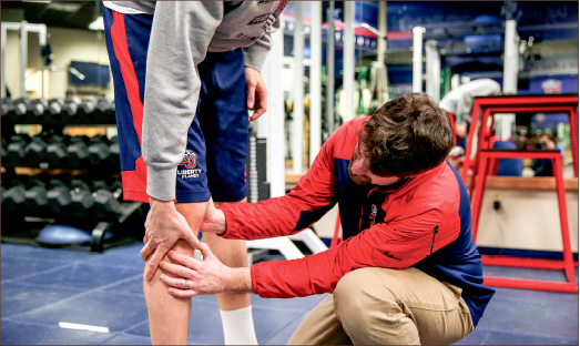 Training — Students in the athletic training program must go through clinical rotations in which they get hands-on experience. Photo credit: Courtney Russo