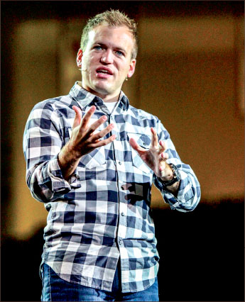 care — Johnnie Moore spoke on recent Christian oppression in the Middle East. Photo credit: Ruth Bibby