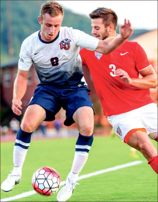 Under PRessure — Sophomore midfielder Bay Kurtz shields ball at half-field. Photo credit: Leah Seavers