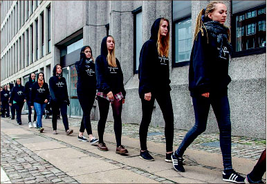 PEACE — Participants walk silently in a single-file line to represent victims of sex trafficking. Photo provided