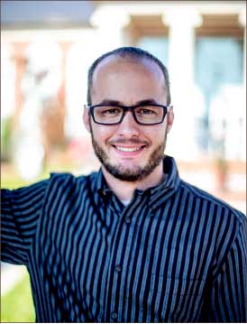 inspired — John Wesley Reid’s passion for writing came after being involved with his alma mater’s campus newspaper. Photo credit: Leah Seavers