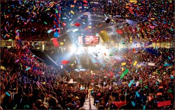 Celebrate — Confetti came down in the Vines Center during Winterfest 2014. Photo credit: James Hancock