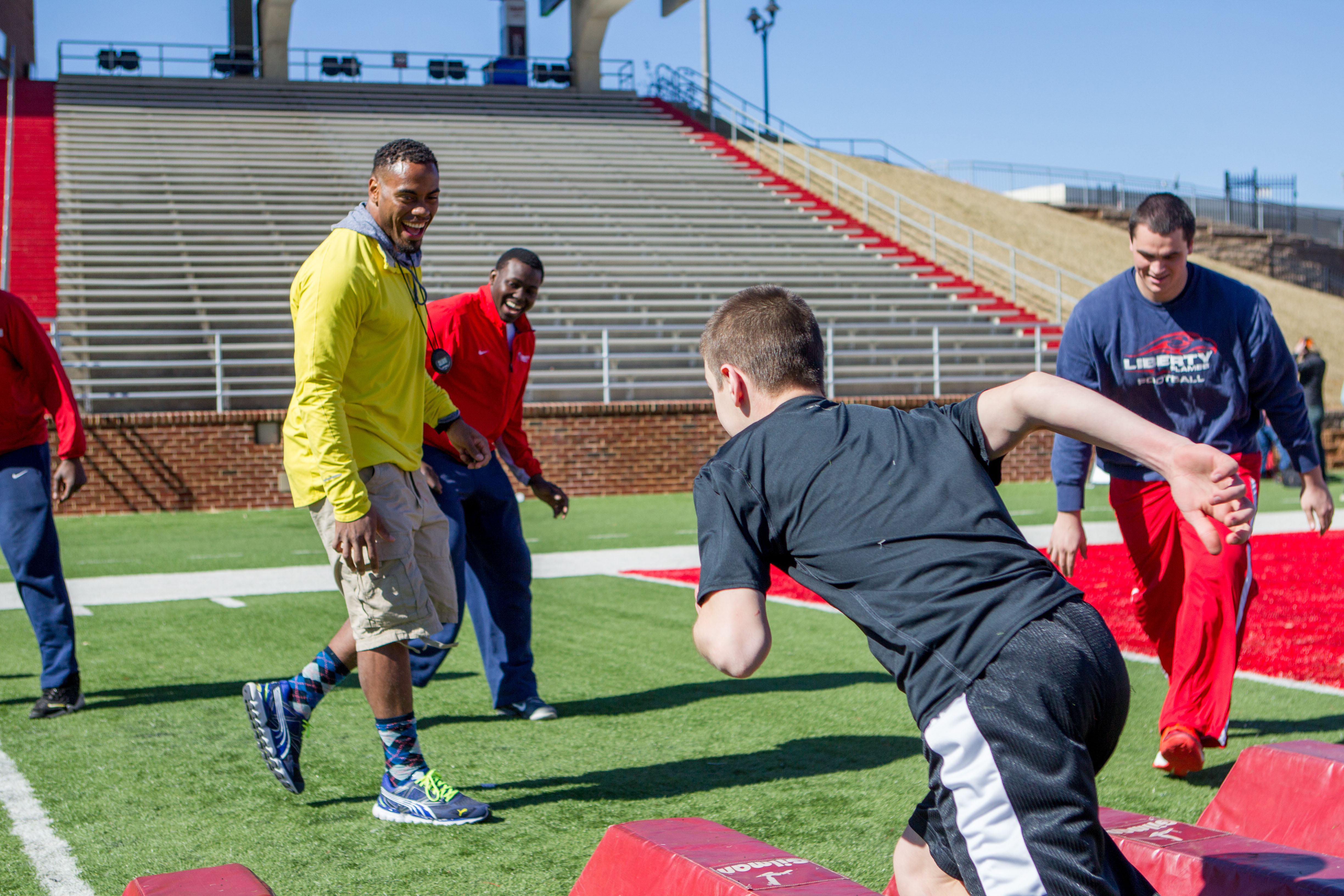 Rashad Jennings and Mike Brown hold a camp at Williams Stadium on February 22, 2013. (Photo by Kevin Manguiob)