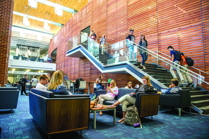 LOUNGE — Students study and socialize at the new Montview Student Union located in central campus. Photo credit: Michela Diddle