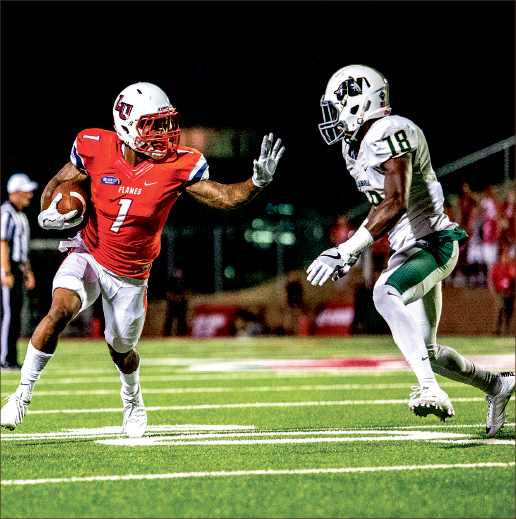 DROWNED — Jacksonville could not handle Liberty’s high-powered offense, including senior wide receiver Zac Parker. Photo credit: Caroline Sellers |
