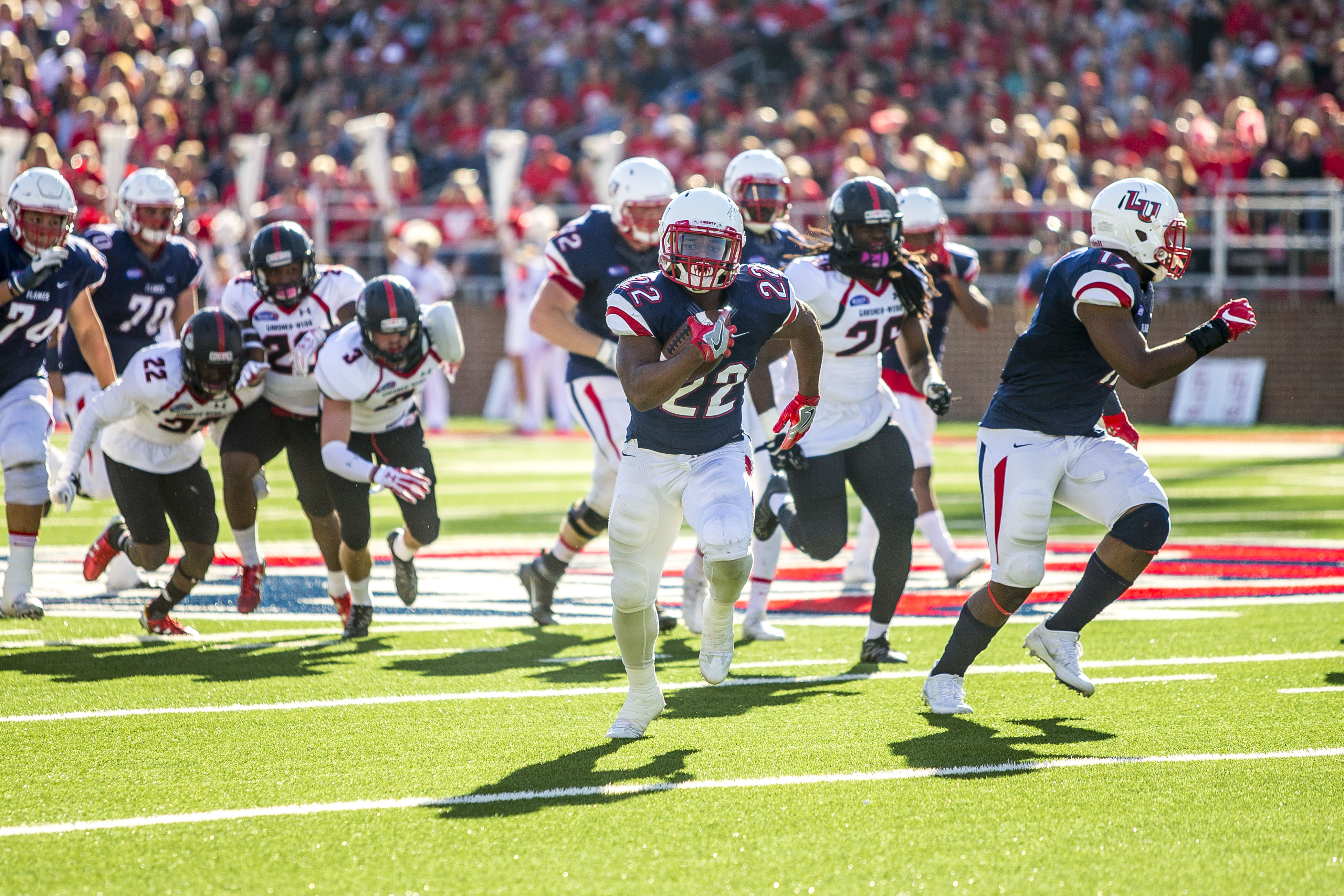 SCREEN — Junior running back Todd Macon caught a pass from freshman quarterback Buckshot Calvert and ran for a 40-yard gain. Photo credit: Michela Diddle