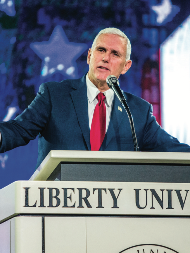 GOVERNING THE FUTURE — Indiana Gov. Mike Pence (left) spoke to students at Liberty’s Convocation Oct. 12 on the future state of the nation and why evangelicals should vote Republican. Photo credit: Michela diddle