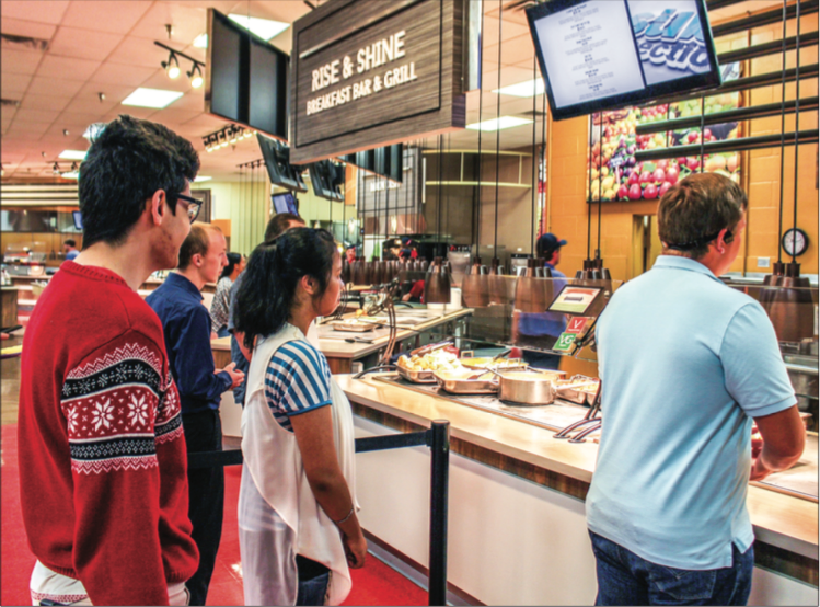 HOT N’ READY — Students waited in line to order a meal from the Rise & Shine Breakfast Bar & Grill at the Reber Thomas Dining Hall. Photo Credit: Christianne Gormley