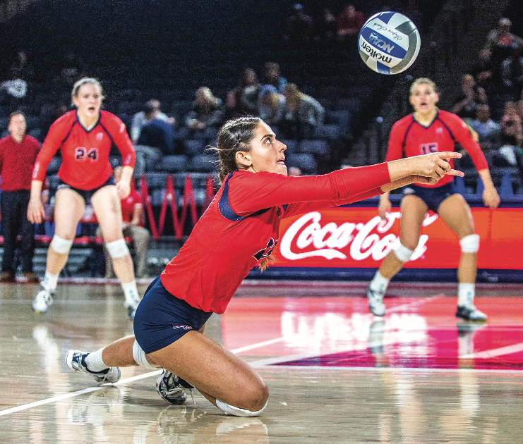 DEDICATION — Senior defensive specialist Michelle Melendez layed out to keep the point alive in her last home game. Photo credit: Michela Middle