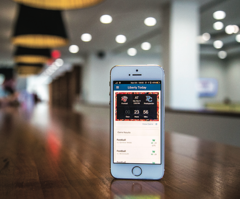MOBILE — The new Liberty Today app allows students to follow sports games. Photo Credit: Rocky Sriskupakporn