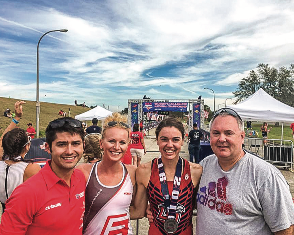 SIXTH — Merryman was joined by her father, Mike, (right) and coach Parker Spencer (left). Photo provided