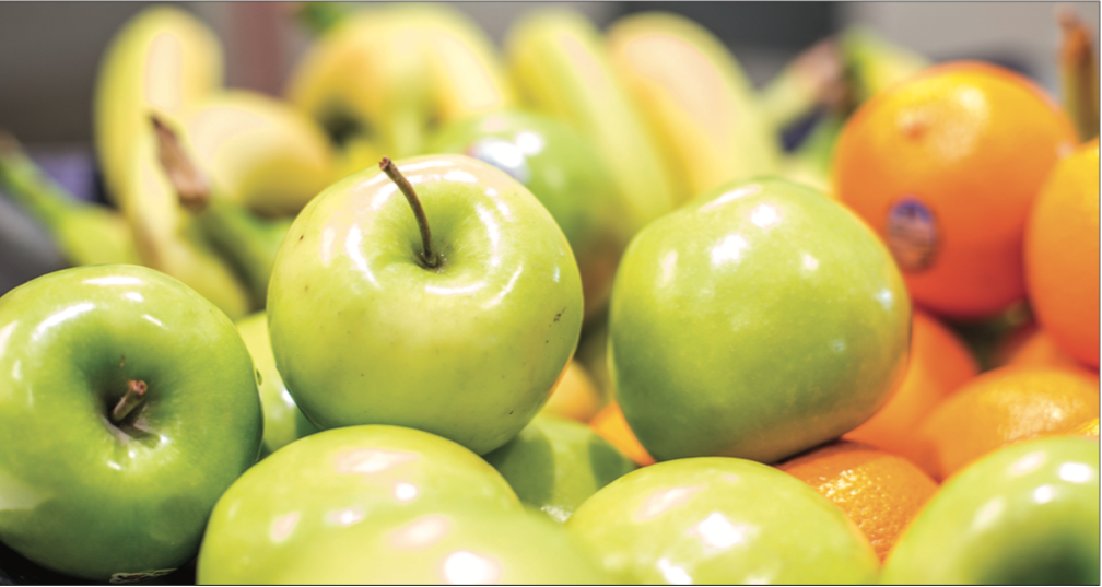ORANGE YOU GLAD — Dining options at Liberty have expanded to include healthy vegan meals and snacks around campus, such as menu items at Garbanzo and fresh fruit at Reber-Thomas. Photo Credit: Amber Tiller