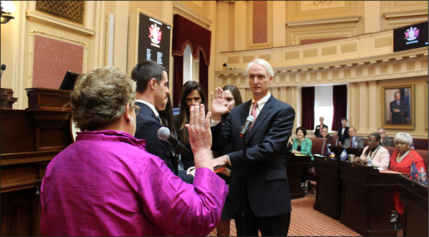 SOLEMNLY SWEAR — Lynchburg attorney Mark Peake took the oath of of office proceeding his election into the Virginia State Senate. Photo Provided